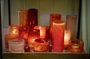 Cylindrical votive - glass - orange red - Ø 8,5 x 8,5 cm - p/6